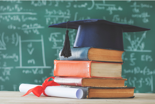 Graduation cap on a stack of books